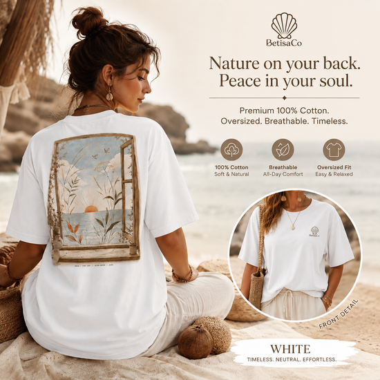 Back view of SOLARA I First Light tee showing botanical sunrise artwork in soft earth tones